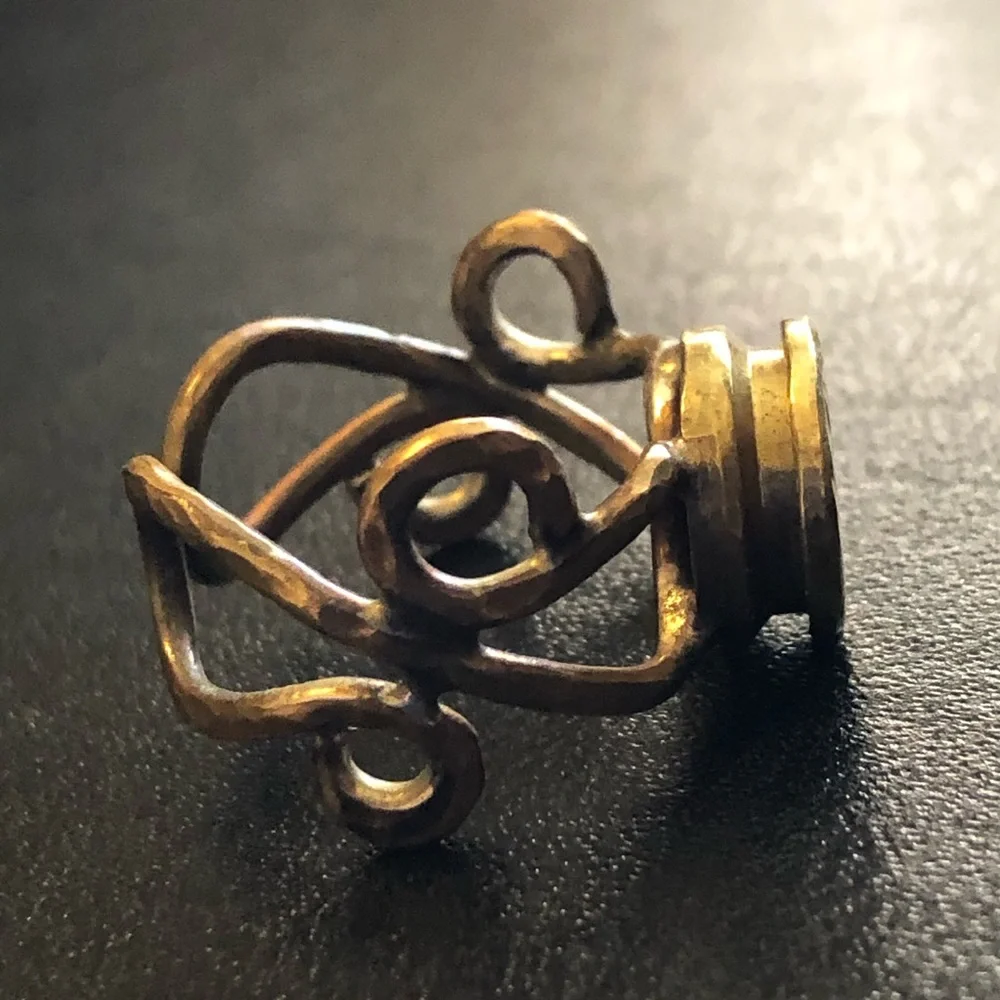 Vintage handmade hammered brass bullet primer ring